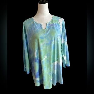 A dreamy Atelier5 by Gozde Yilmaz tunic top in soft, watercolor shades